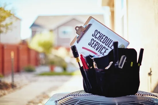 Tool Bag On Top Of HVAC Unit<br />
